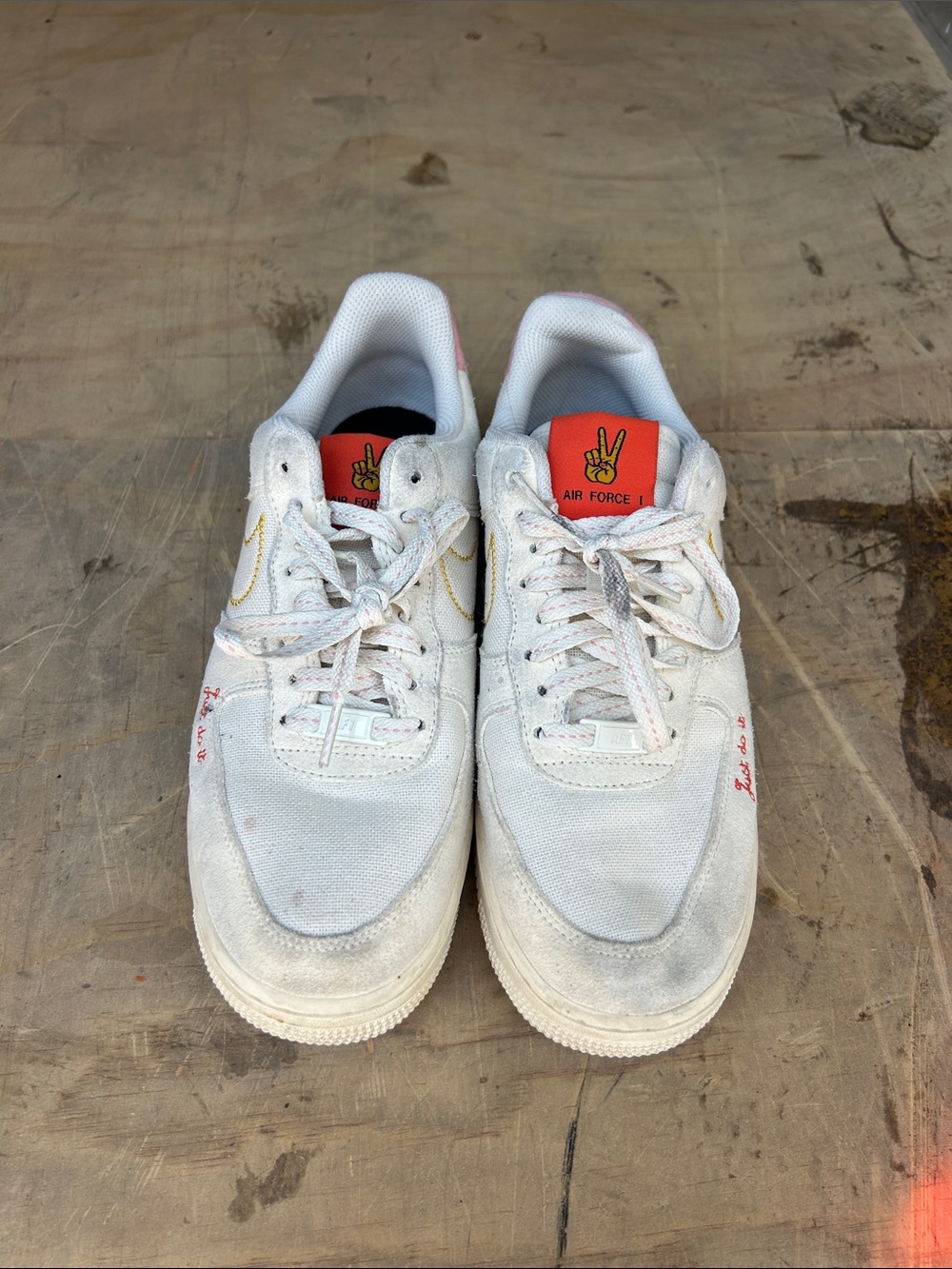 Nike White Air Force 1 Low with Orange Tongue Accent